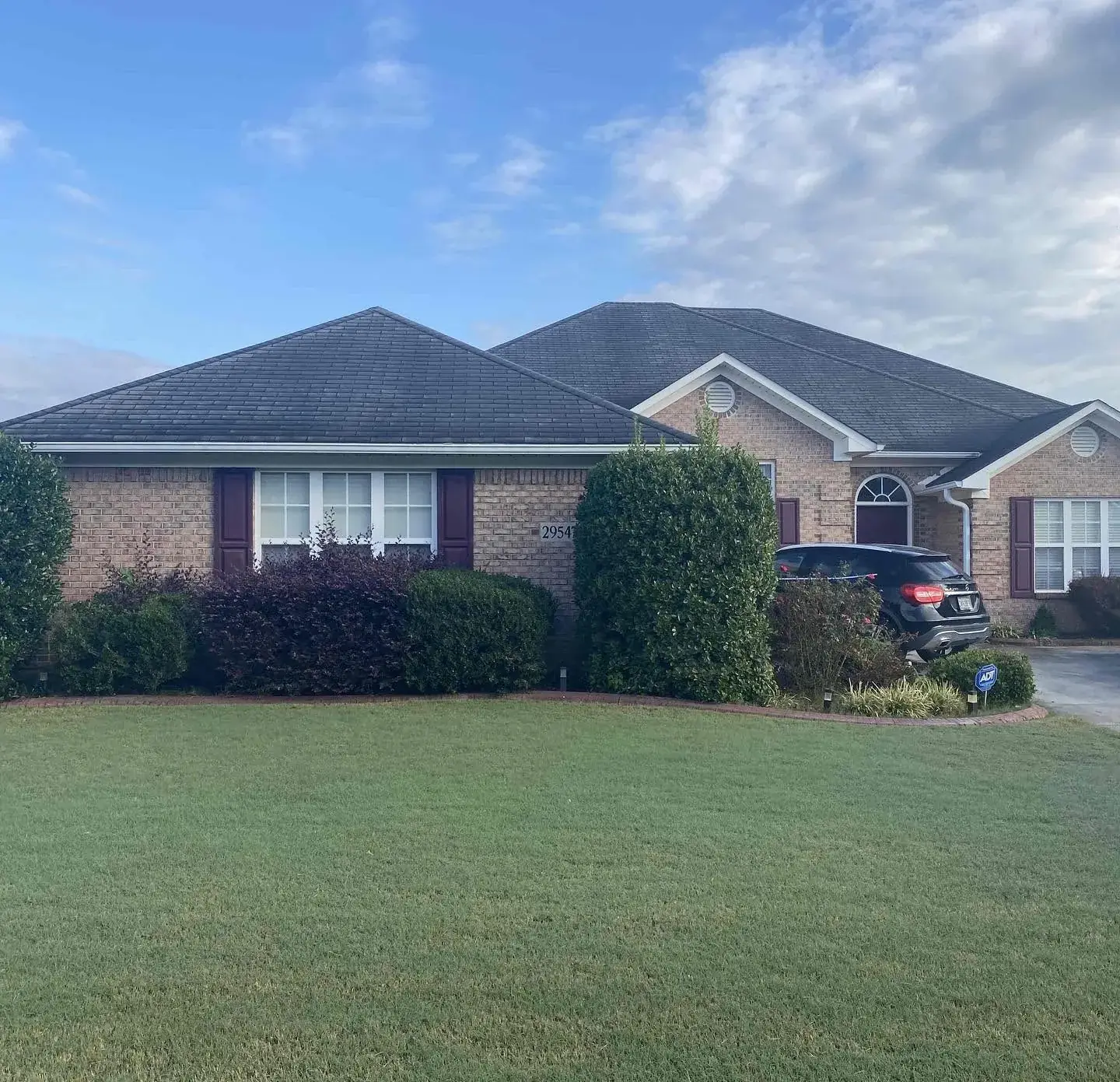 Experienced roofing professional inspecting a roof in Orlando FL
